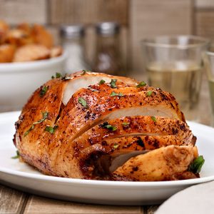 herb seasoned cooked boneless turkey breast